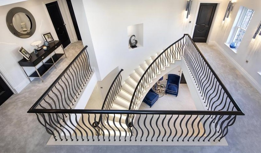 Luxury Curved Staircase - Aerial Landing View