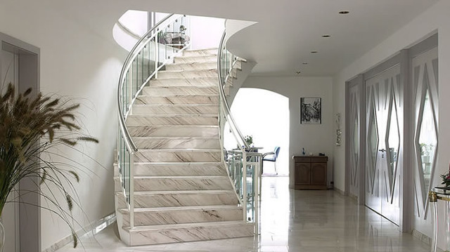 luxury curved staircase in home