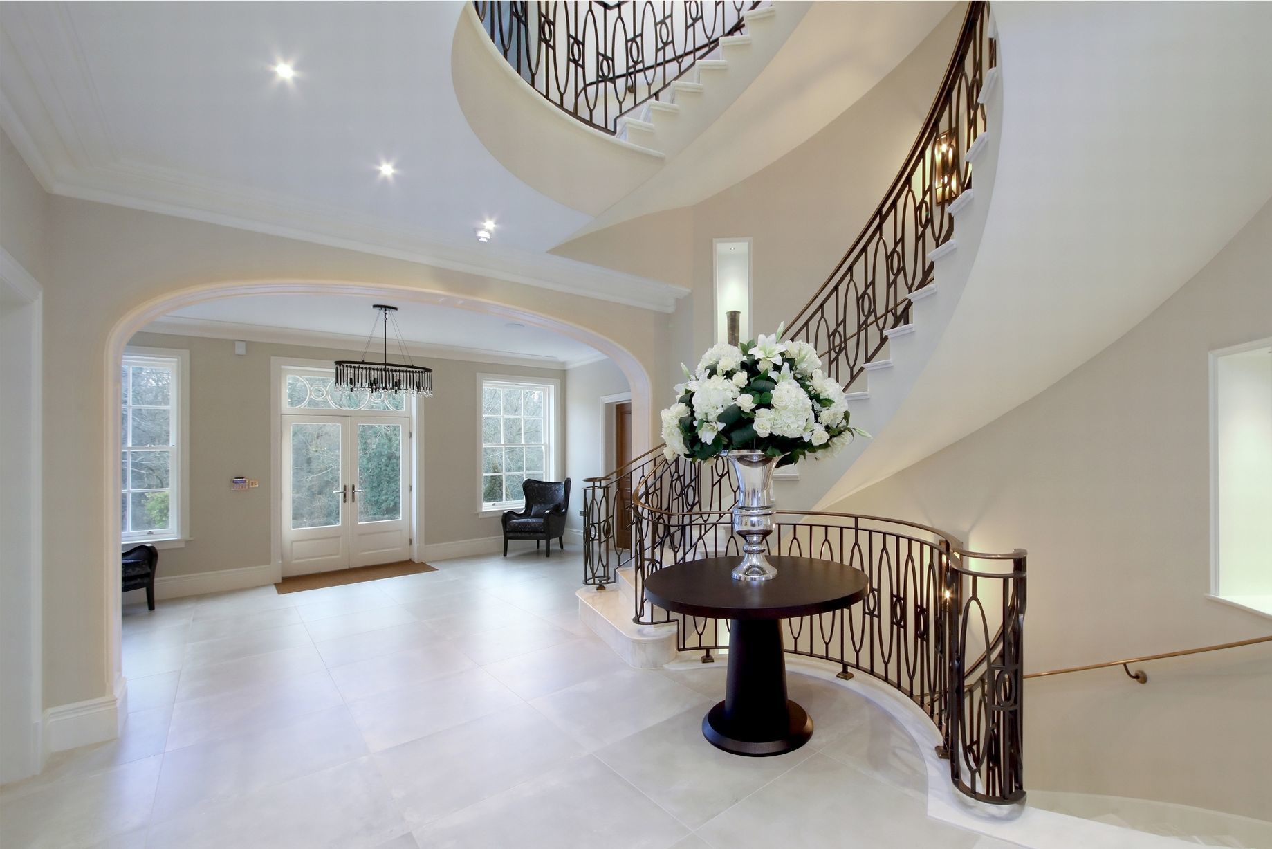 Rear view of curved staircase in UK luxury property