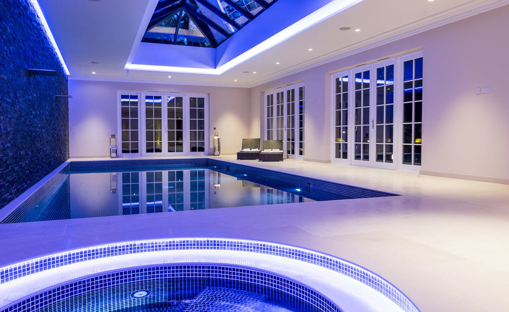 Luxury home indoor pool and jacuzzi spa room