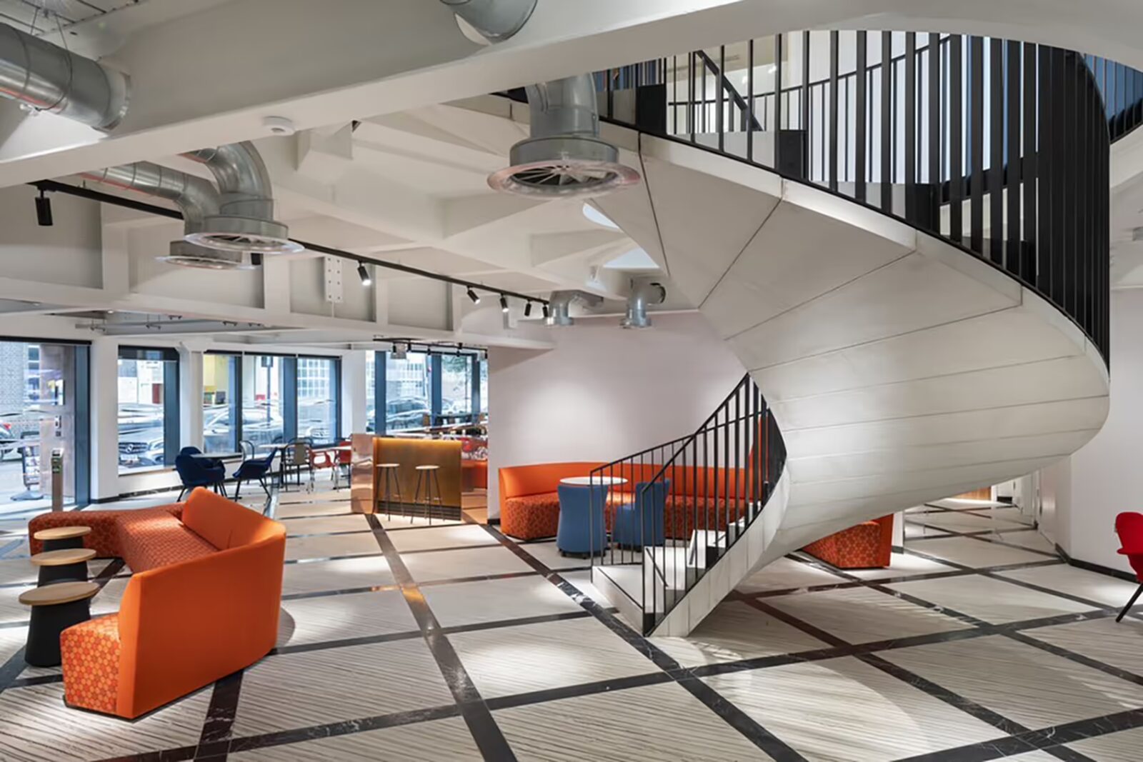 White precast concrete stair units in curved helical configuration