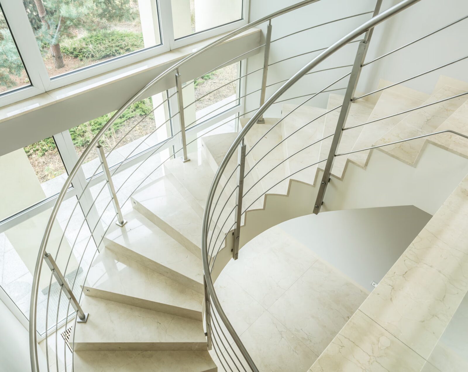 helical stairs covered in marble finish