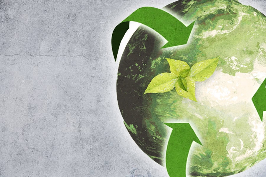 Concrete texture with green sustainability graphic showing circular economy