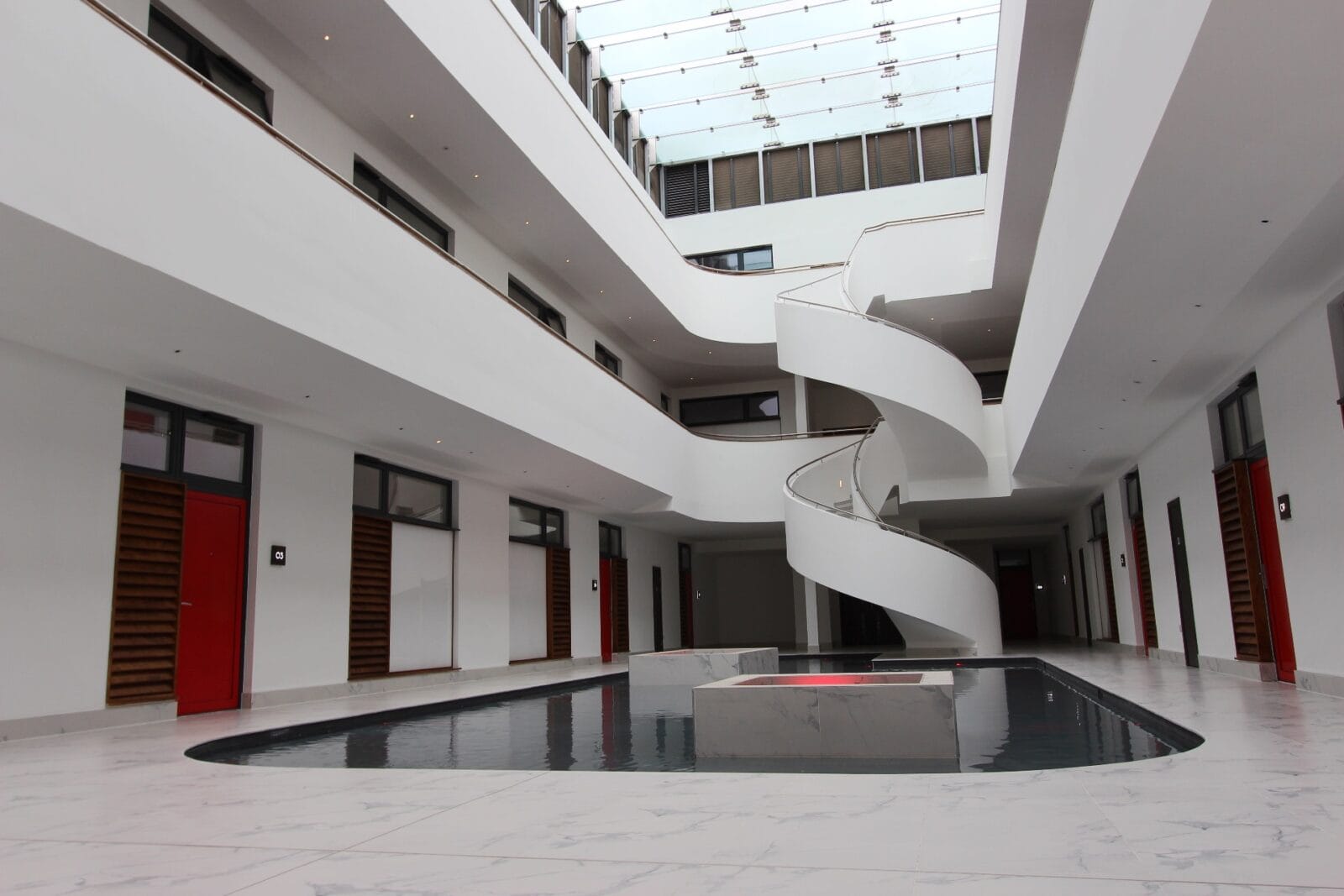 Ground view of two spiral helical staircases at Denham Film studios Buckinghamshire