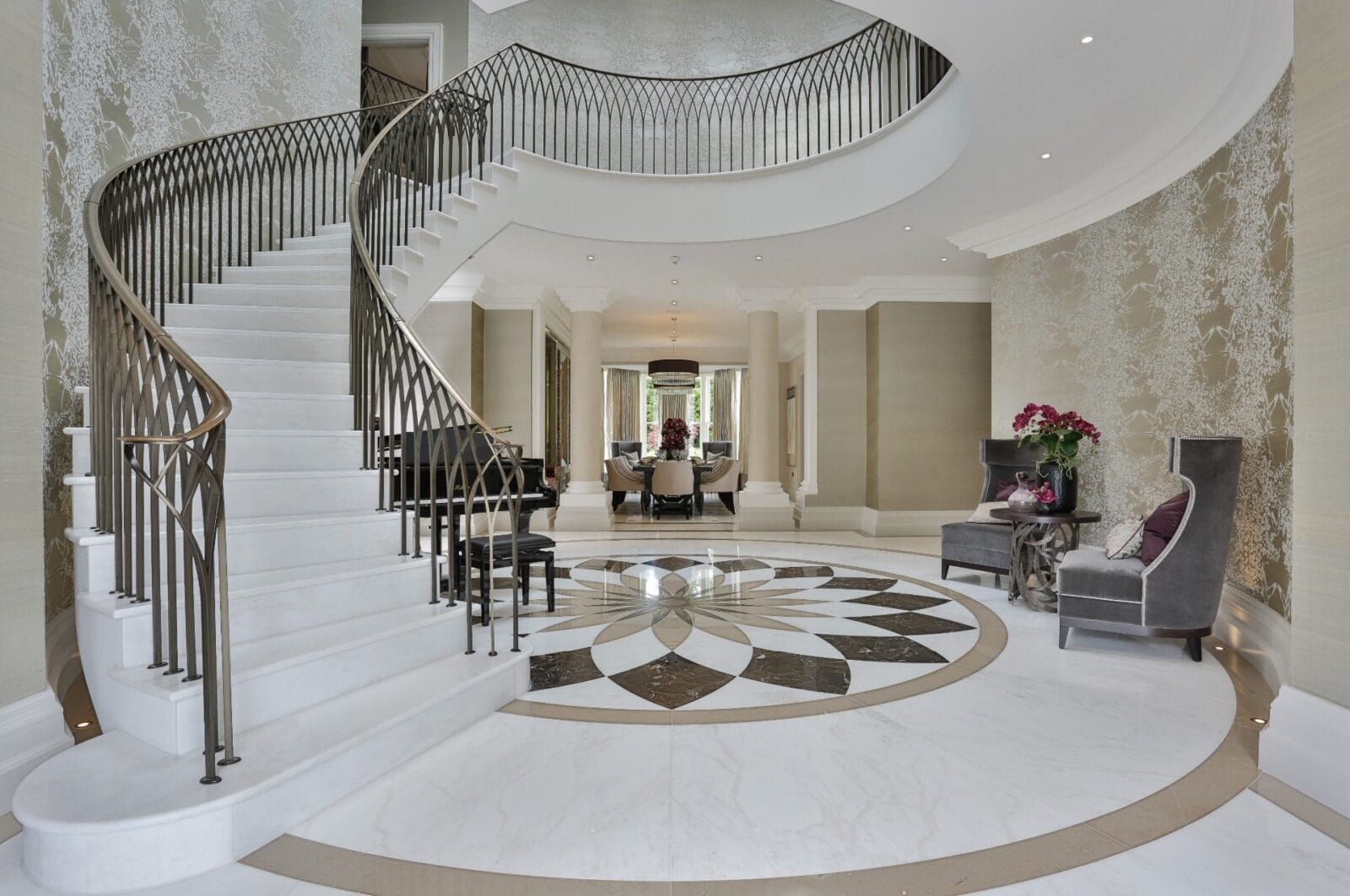 Helical staircase Kings Chase Oxshott grand entrance hall white marble