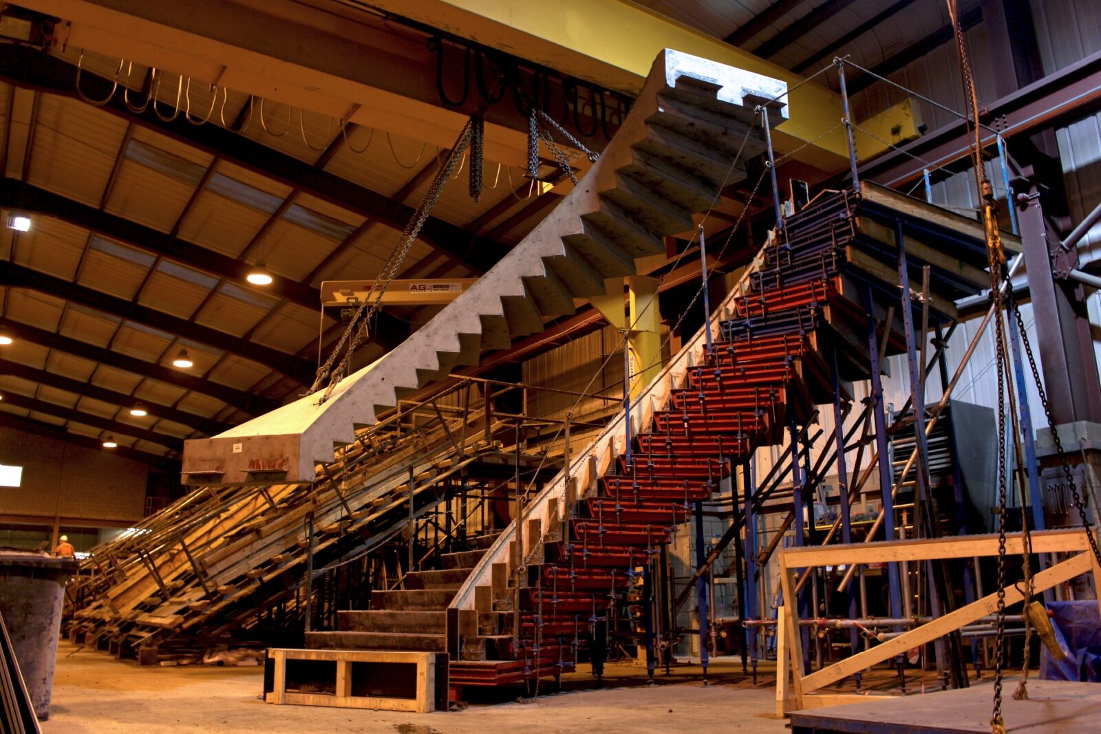 Precast concrete curved stair removed from mould in production factory