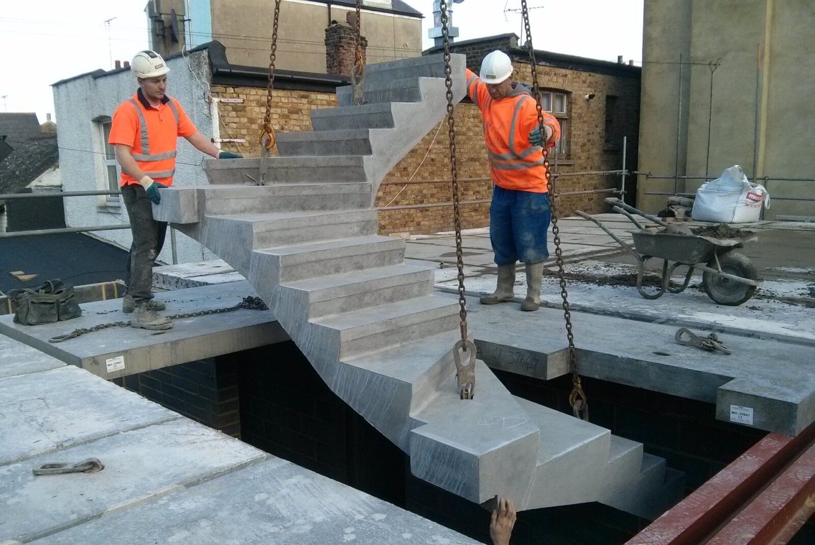 Winder dog leg precast concrete staircase craned into postion